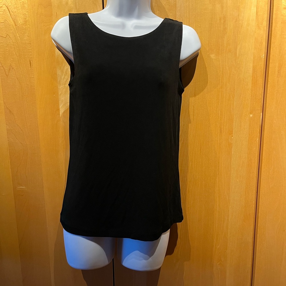 Black top. Travelers by Chico brand. Chicos size 0.